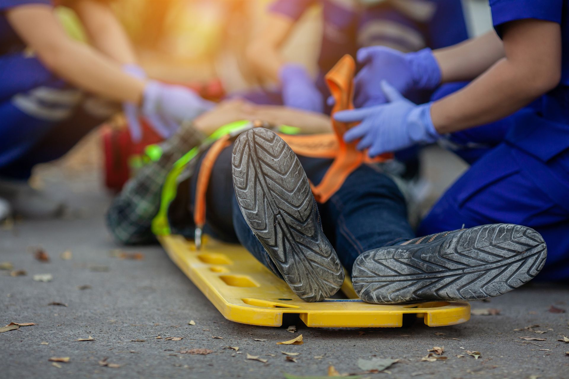 medical professionals around a person laying on a stint