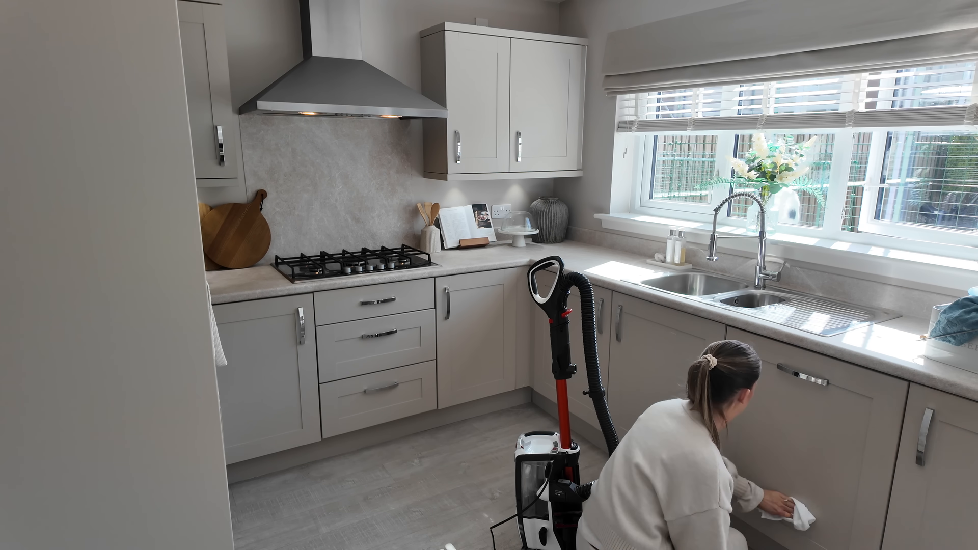 Professional cleaner preparing an apartment for move-out inspection