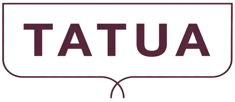 the logo for tatua is a purple and white speech bubble with the word tatua on it .