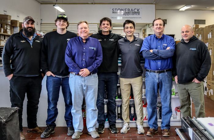 Stoneback Appliance team posing for a picture at the Lawrence Kansas store.