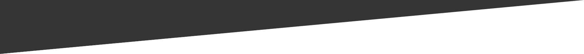 A close up of a piece of black paper on a white background.