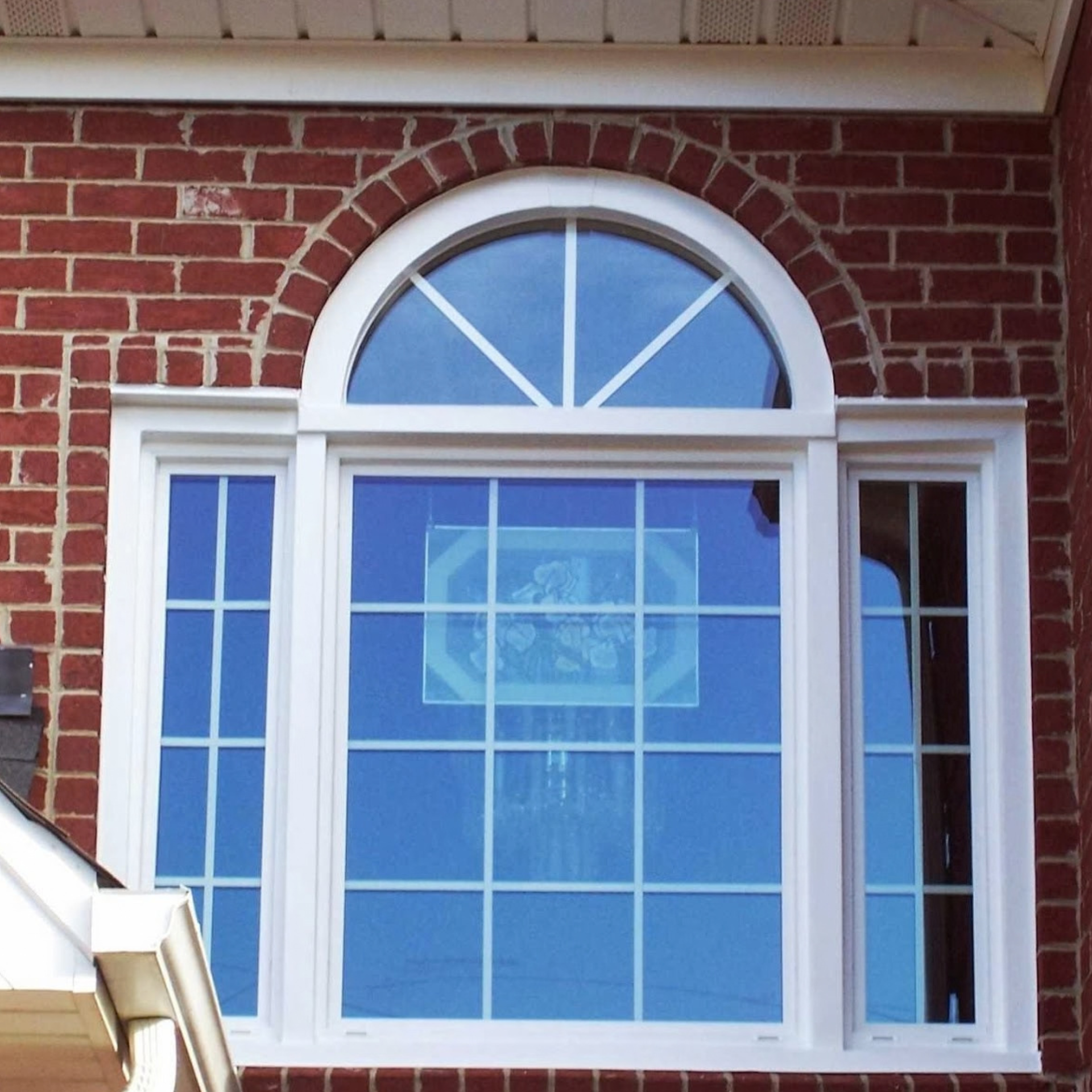 Large picture window with double-hung side windows