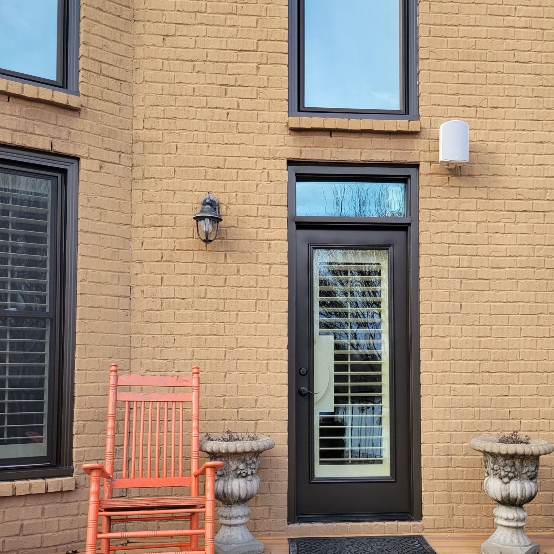 New exterior door installed on brick home
