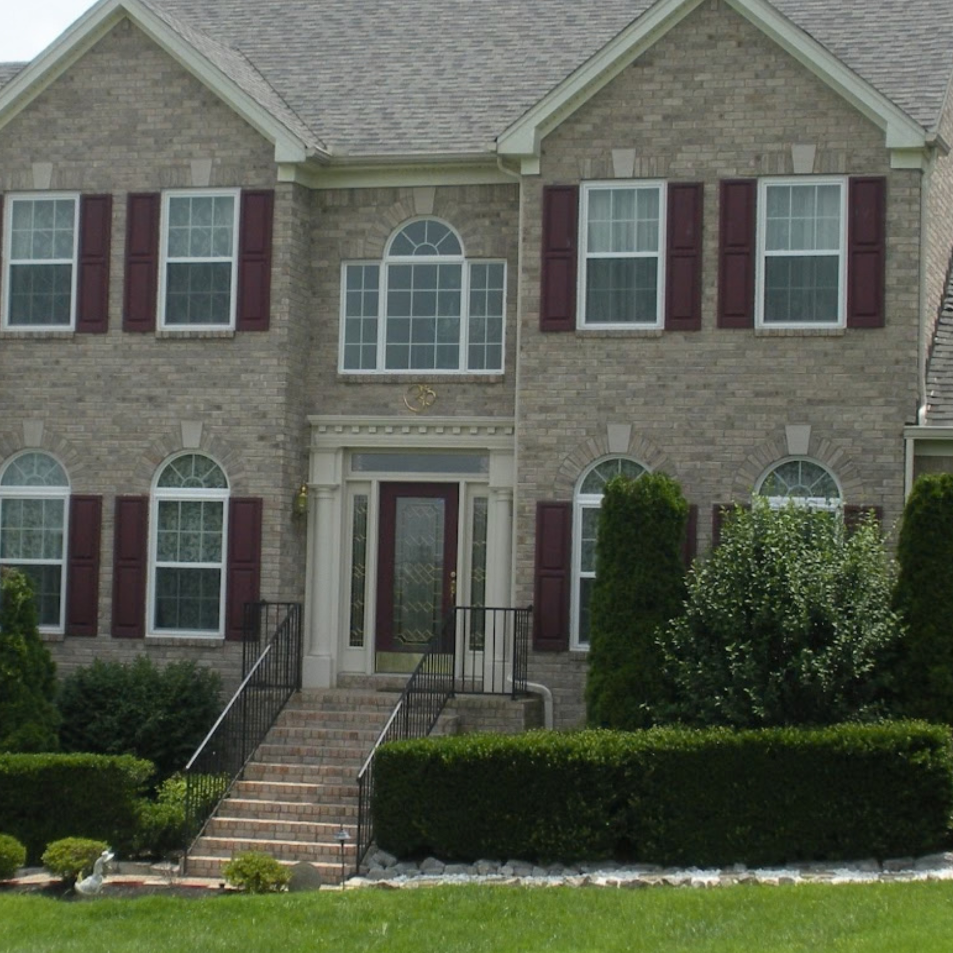 New residential windows installed in brick exterior