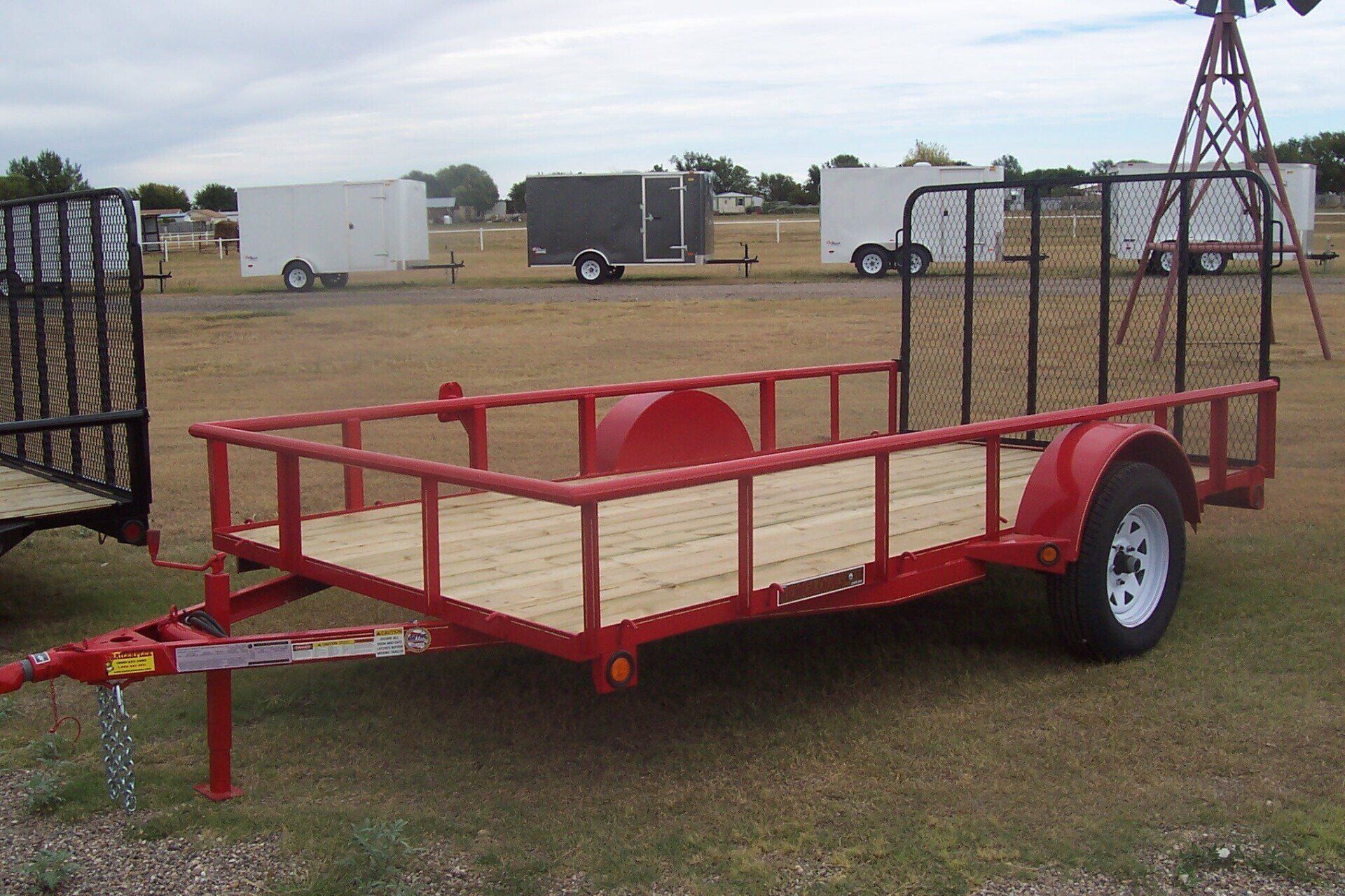 Red utility trailer at Bell Trailerplex