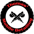Logo for Thomas' Mobile Detailing. Black tire outline, red text, crossed detailing tools.