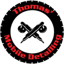 Logo for Thomas' Mobile Detailing. Black tire outline, red text, crossed detailing tools.