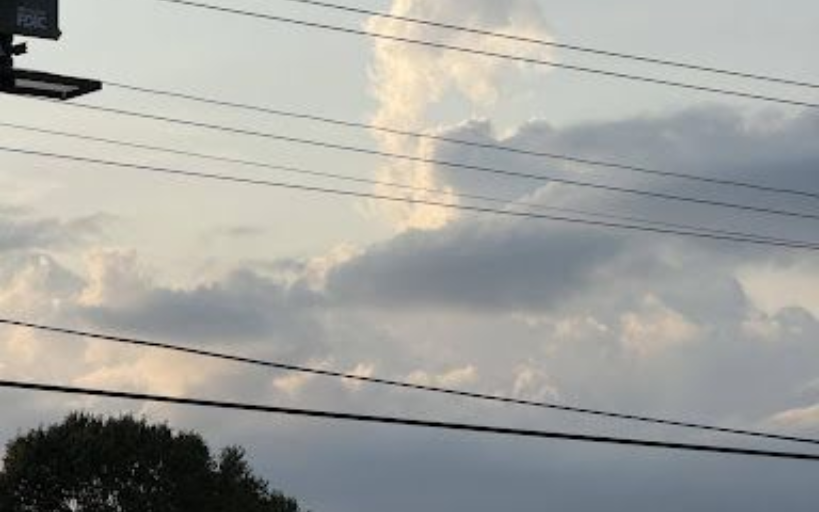 Power lines across sky