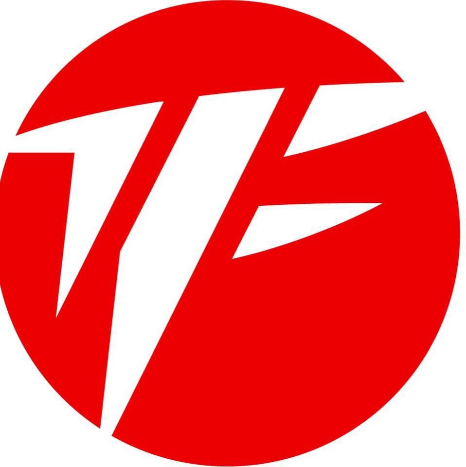 Red circle logo with stylized white letters “TV” inside