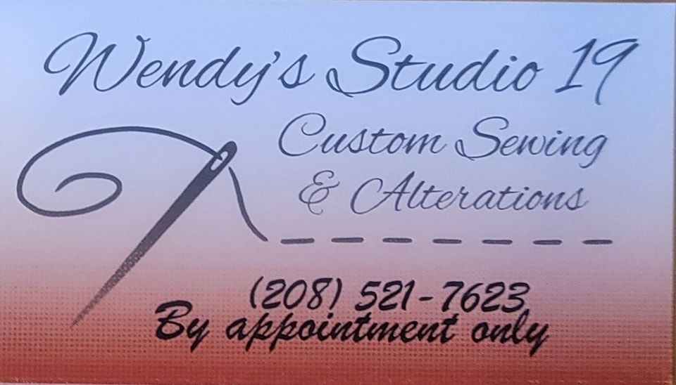 Wendy’s Studio 19 business card with scissors graphic, custom sewing and alterations, phone number, by appointment only