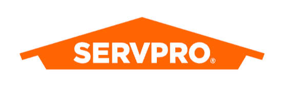 SERVPRO logo in white on an orange house-shaped banner