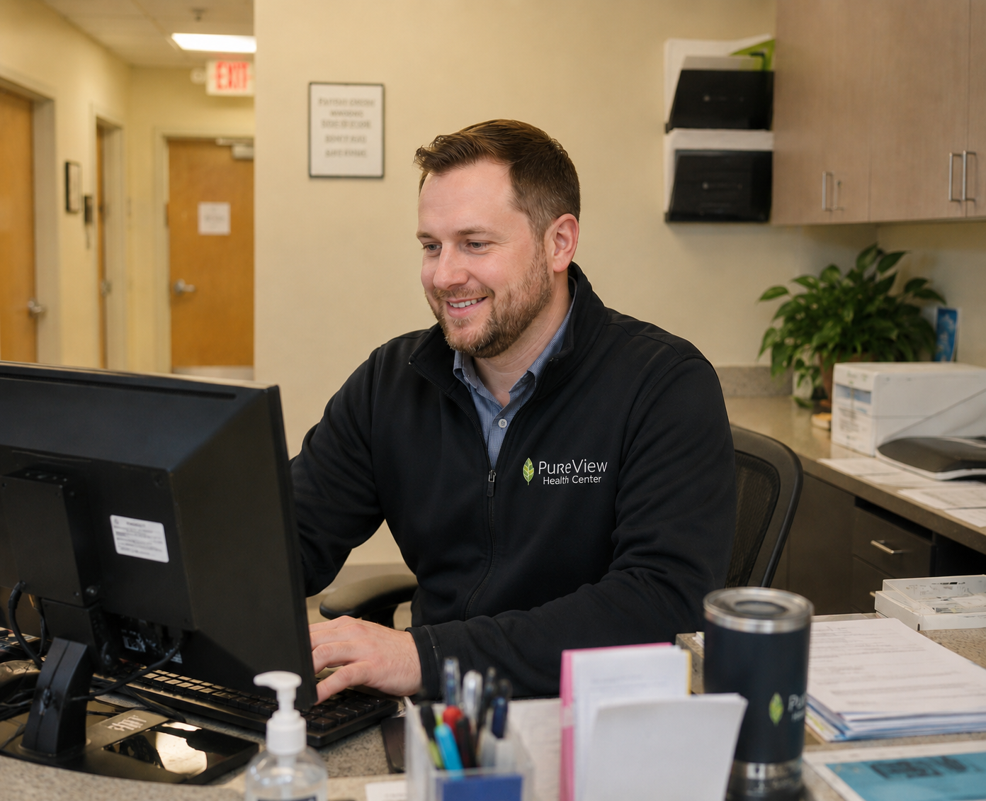Man sitting at desk scheduling