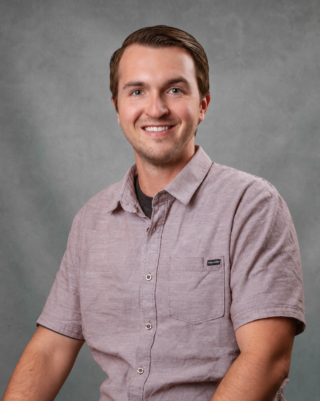 a man smiling at camera.
