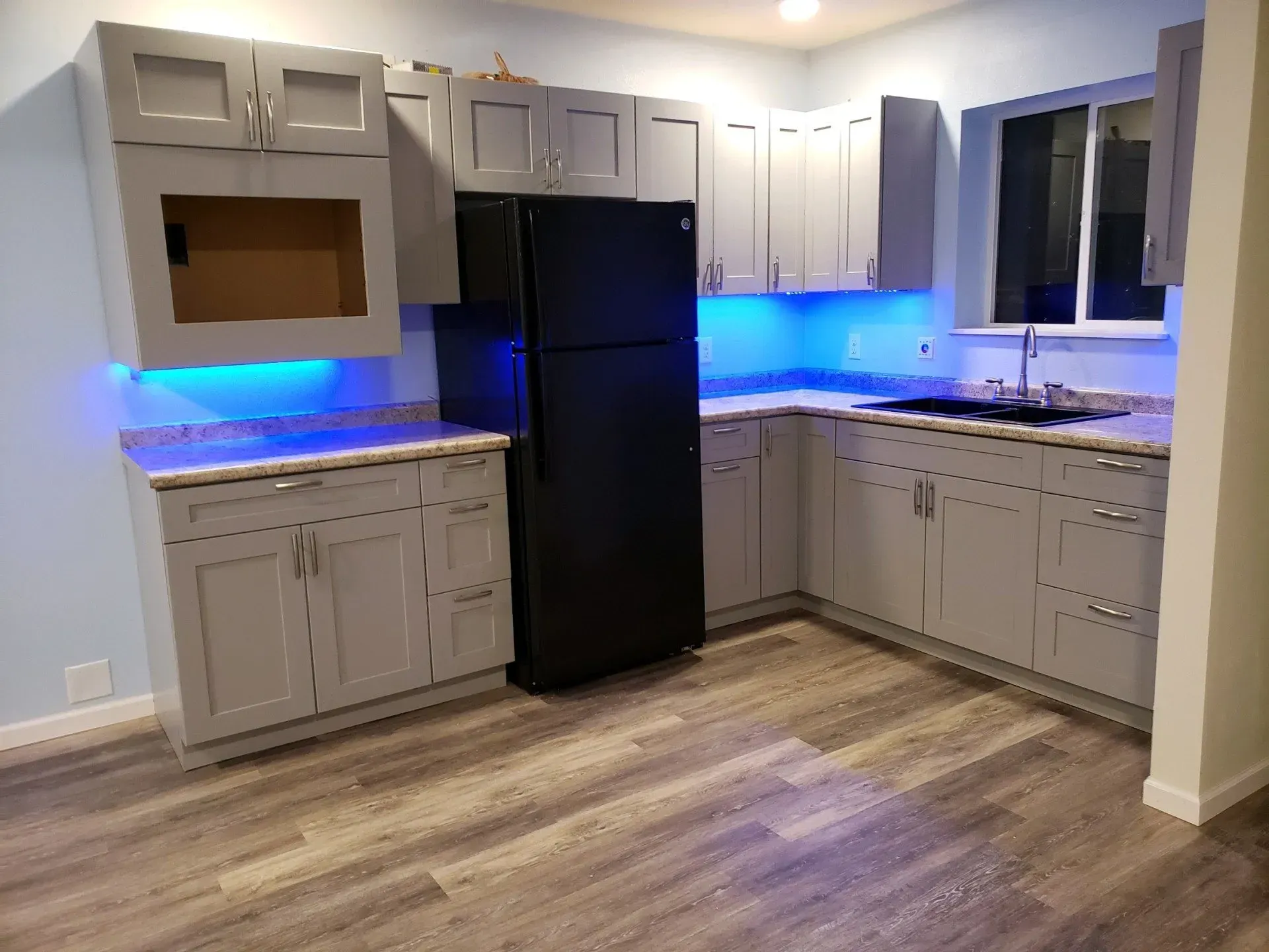 Cabinets And A Black Refrigerator — Sioux City, IA — Construction Plus LLC