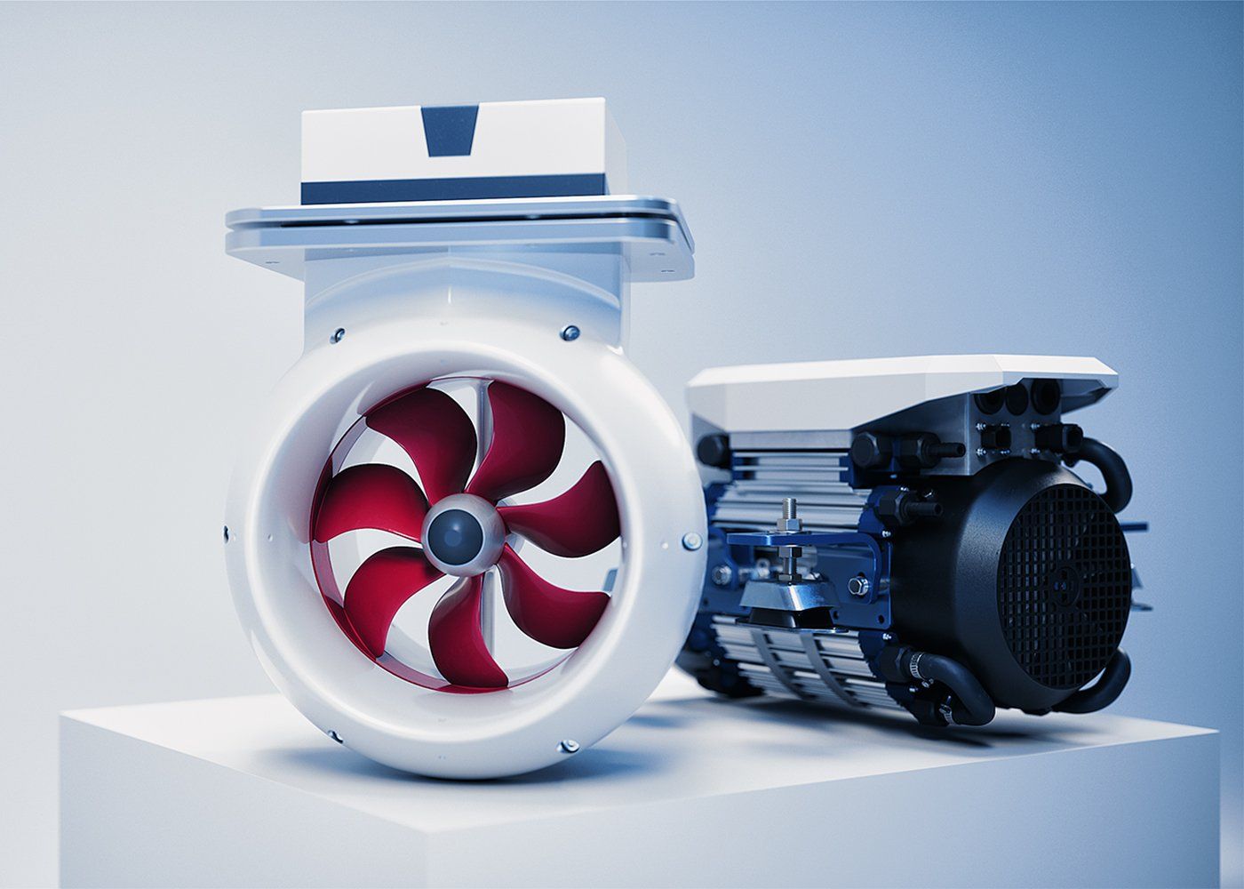 A white tunnel thruster unit with red blades sits on a pedestal next to a dark industrial motor component.