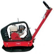 A red and black machine with a gas engine on a white background.