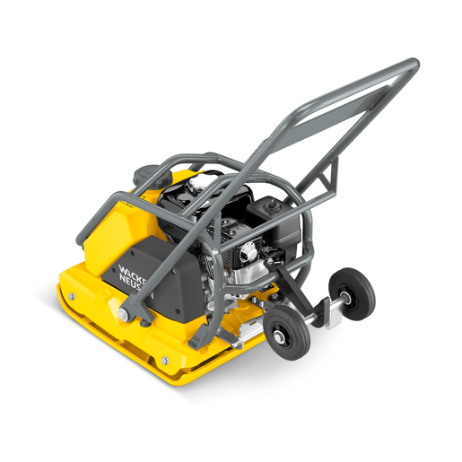 A yellow and gray machine with wheels and a handle on a white background.