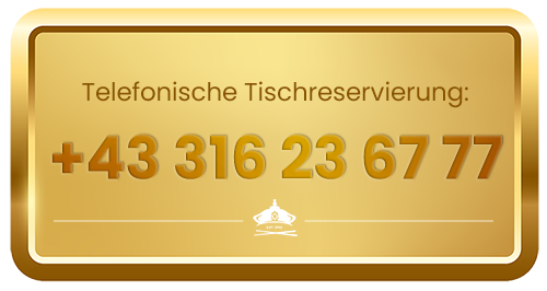 ein goldenes Schild mit Telefonnummer