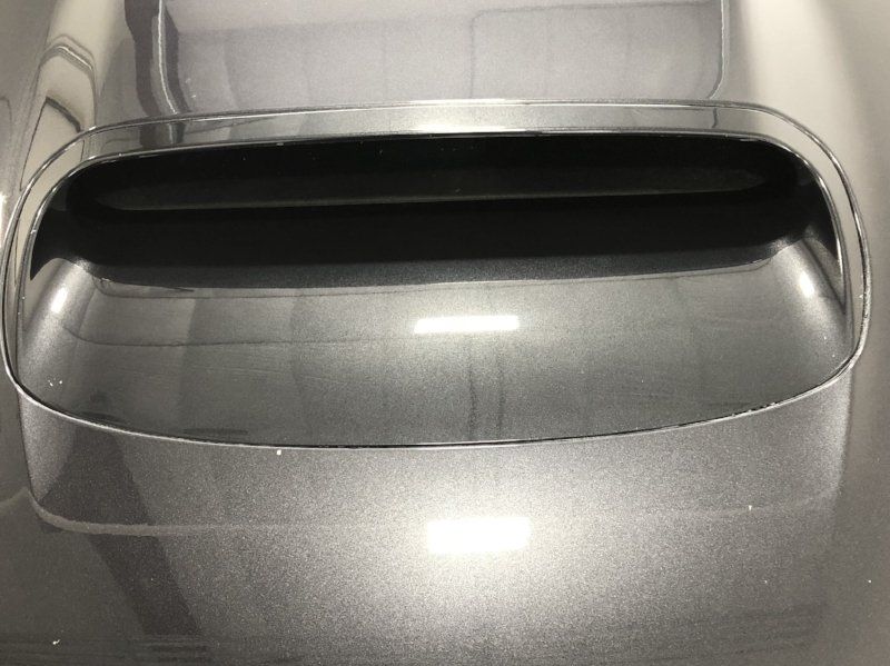 A close up of the hood of a car