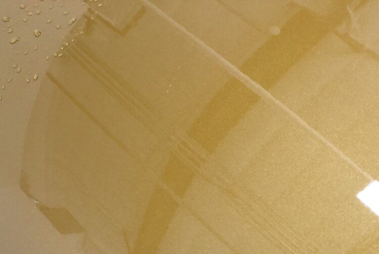 A close up of a staircase with water drops on it.