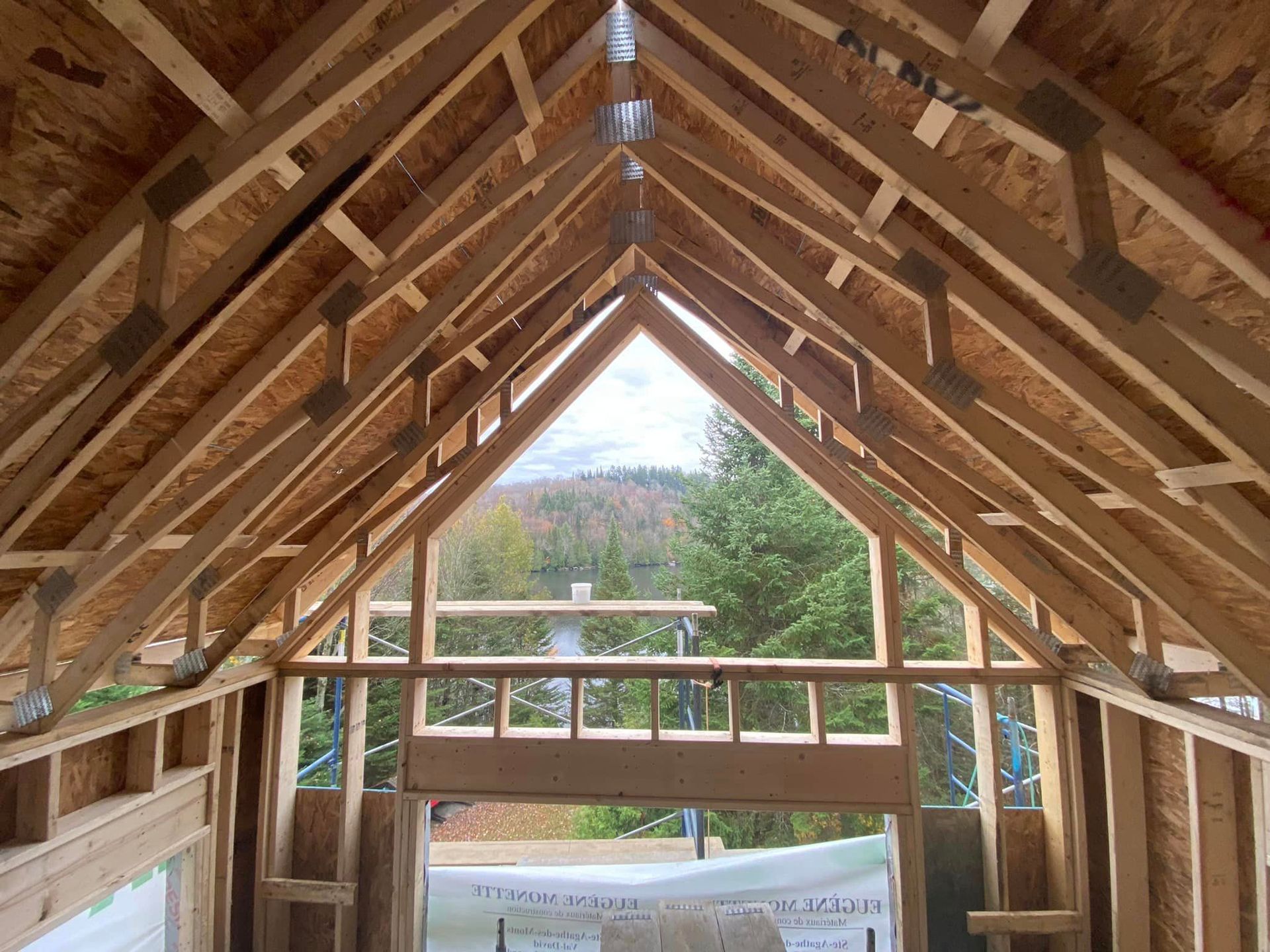 The inside of a building under construction with a large window