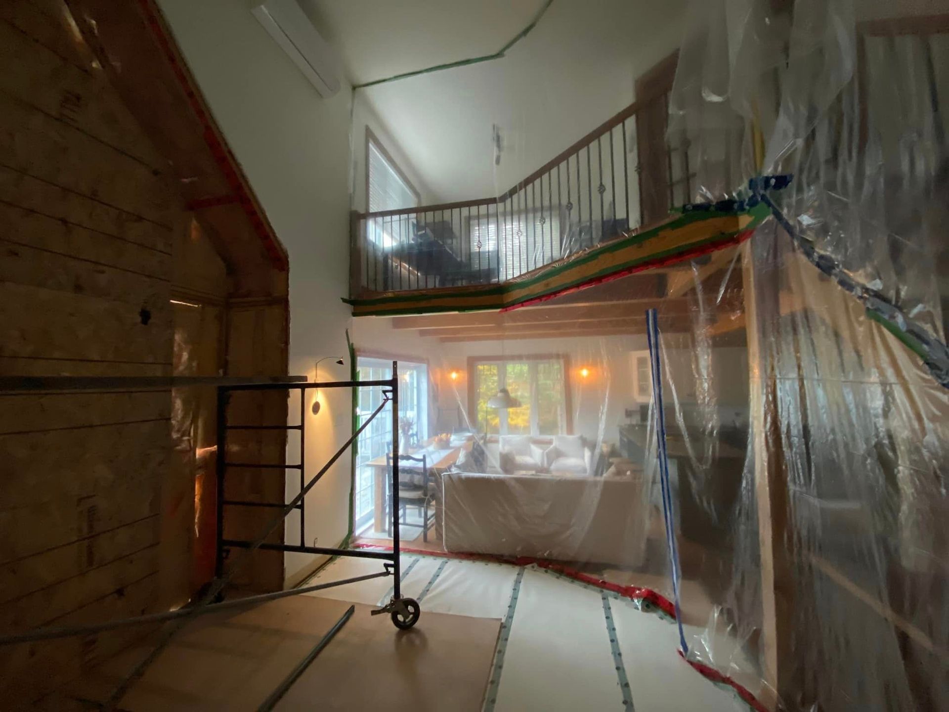 A large room with a scaffolding in the middle of it.