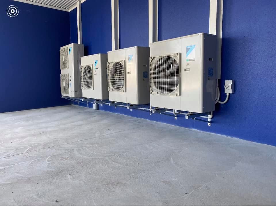 Group of Air-conditions Attached to the Wall — Air Conditioning Newcastle