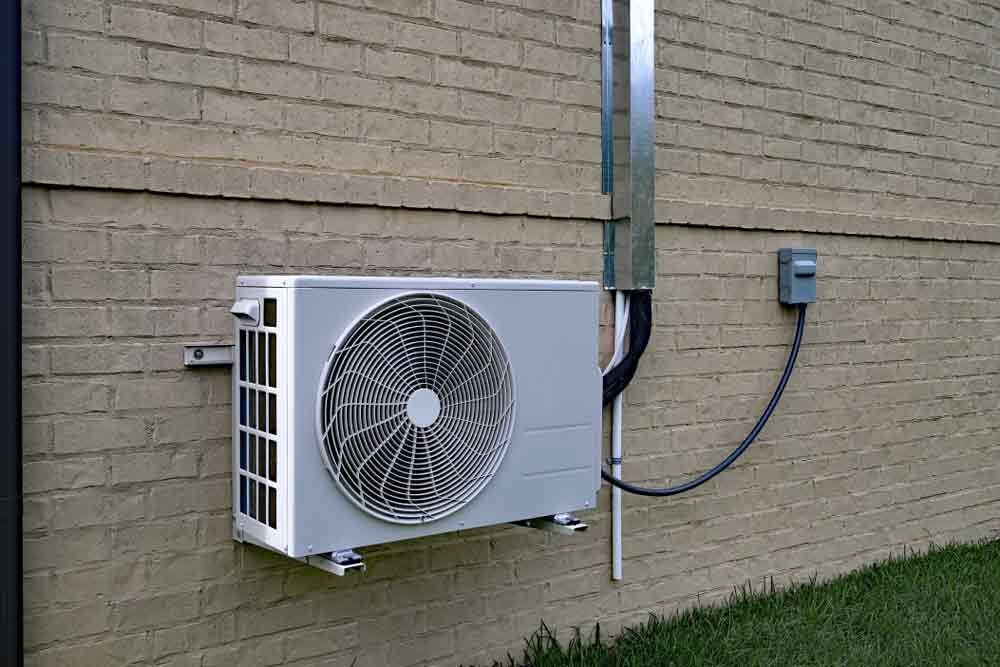 Man Installing Air Conditioner