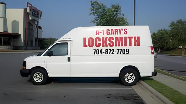 A White Van Says A-1 Gary 's Locksmith On The Side