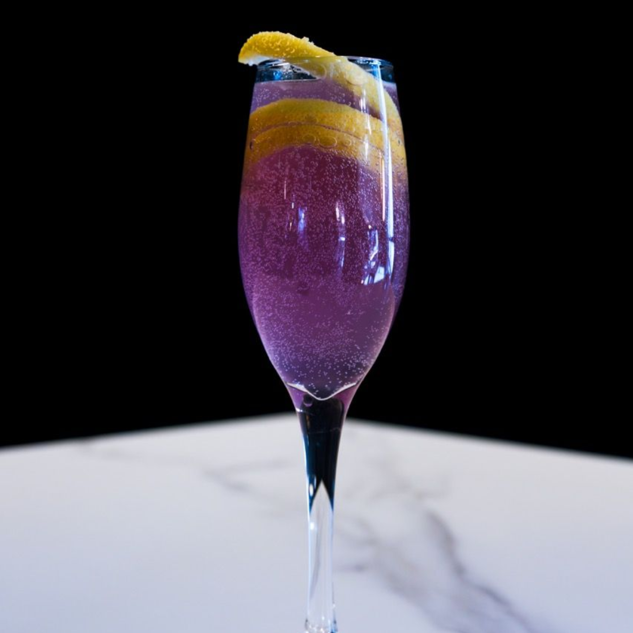 Try the French 75 at Six Mile Ordinary in Columbia, MO.