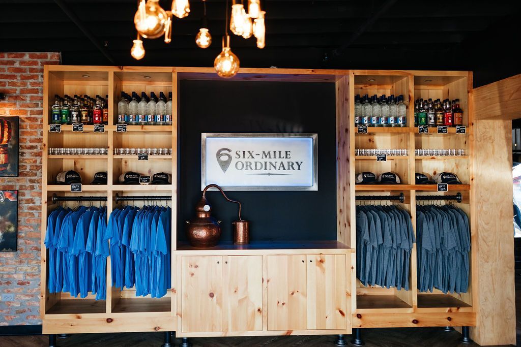 Shop T-Shirts, Spirits & More From Six-Mile Ordinary's Line of Merch in Columbia, MO.