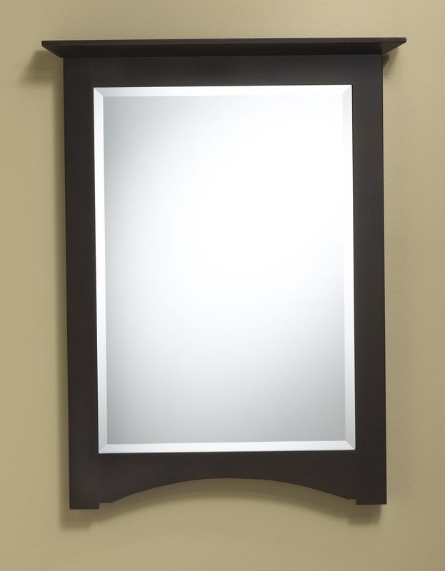 Dark-framed wall mirror with a white reflective surface and a curved bottom edge