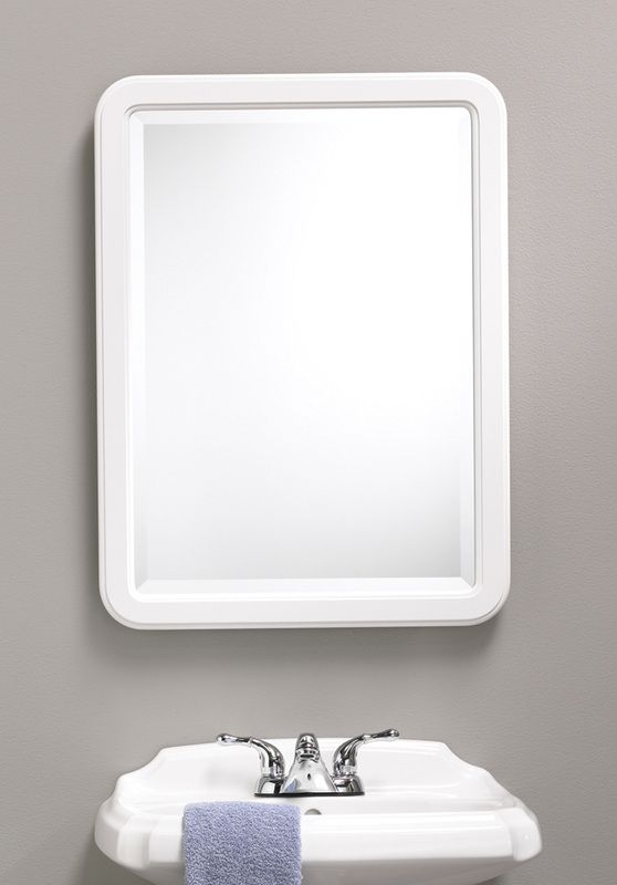 Bathroom mirror above white sink with chrome faucet on a gray wall