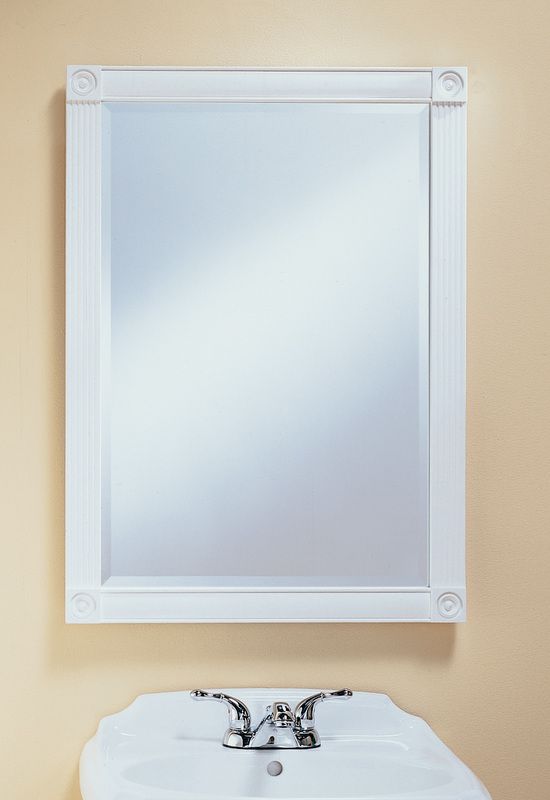 White framed bathroom mirror above a white sink and chrome faucet against a beige wall.