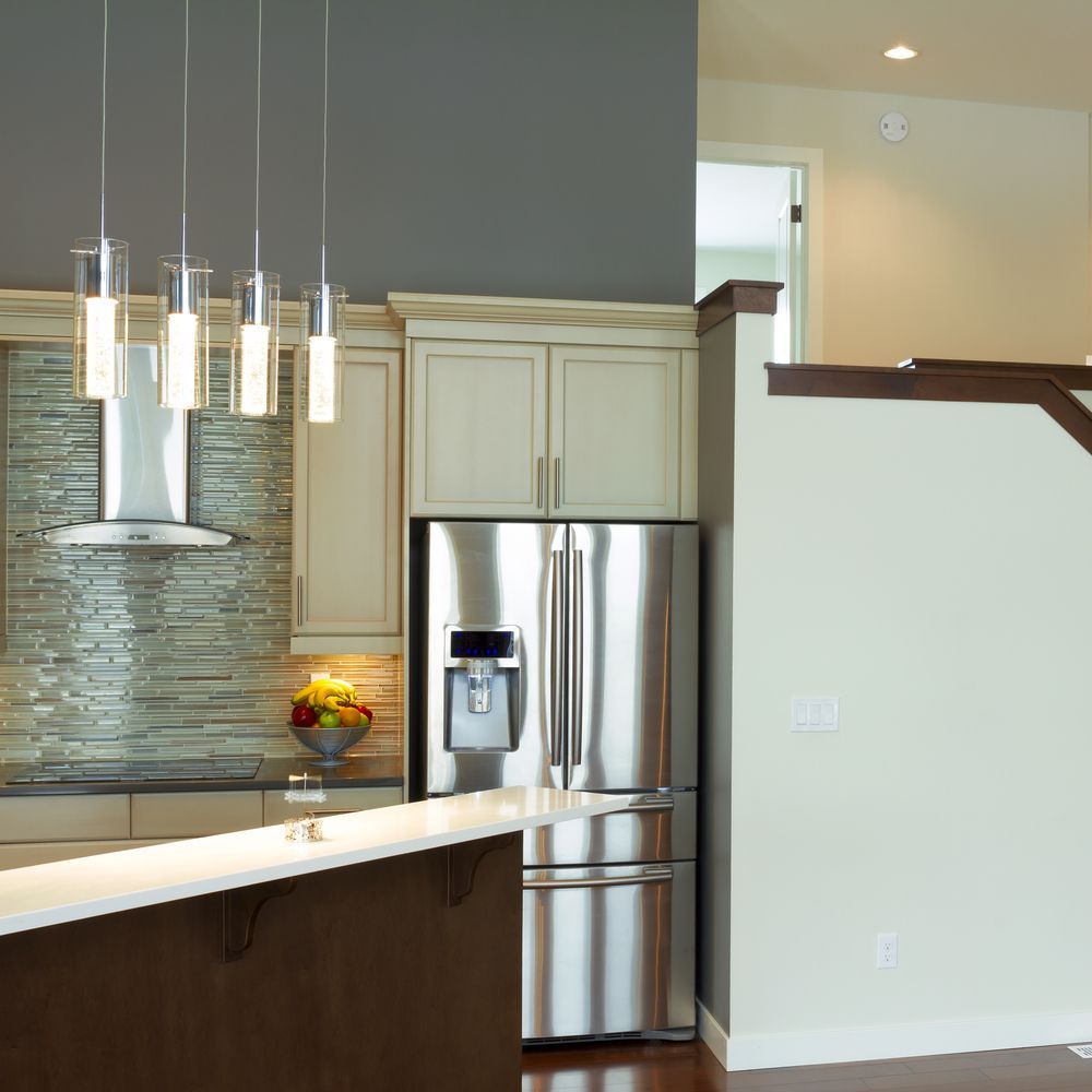 Kitchen With Stainless Steel Refrigerator — EBS NQ Electronic Building Systems in Kirwan, QLD