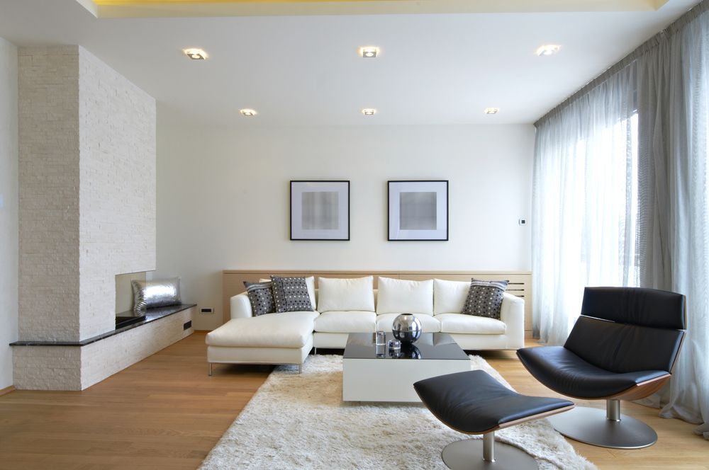 Modern Living Room With White Sofa — EBS NQ Electronic Building Systems in Kirwan, QLD