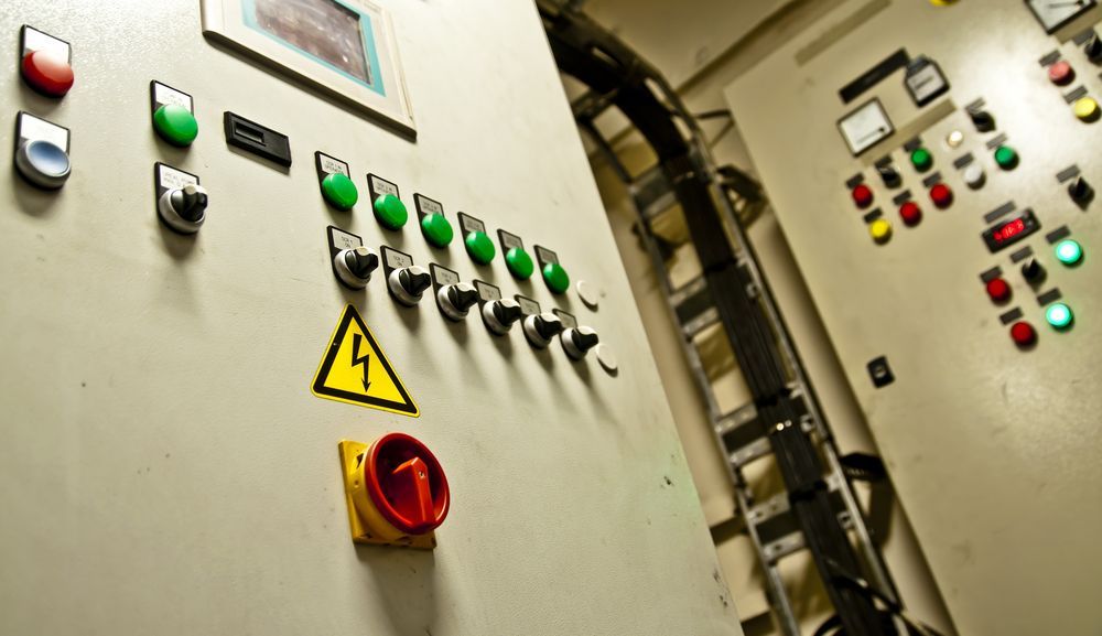 Control Panel With Buttons, Switches, and Warning Symbol — EBS NQ Electronic Building Systems in Kirwan, QLD