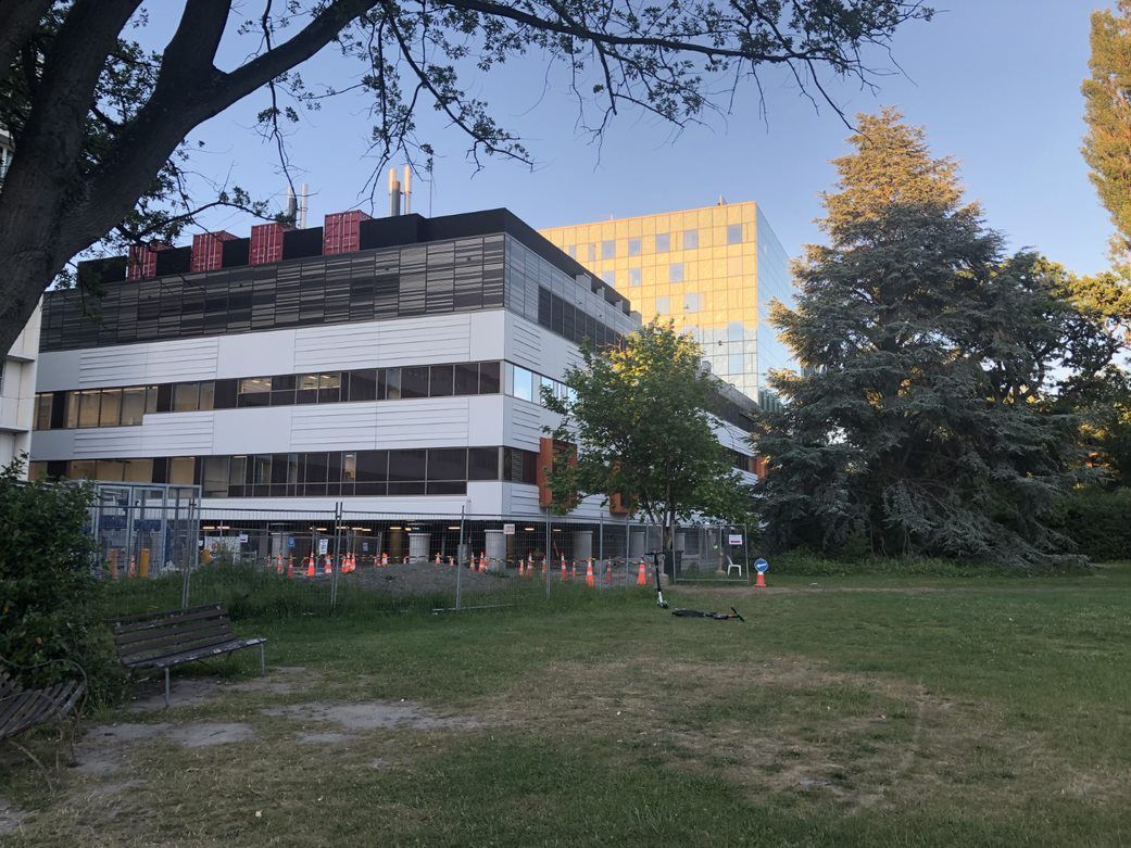 Multi-story White and Gray Building With a Damaged Roof — EBS NQ Electronic Building Systems in Kirwan, QLD