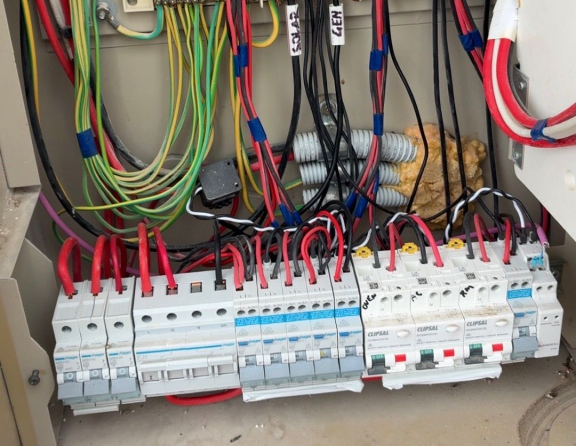 White Solar Inverters and Electrical Boxes Mounted — EBS NQ Electronic Building Systems in Kirwan, QLD