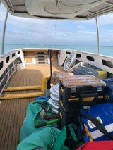 Deck of a Boat With Tools, Gear, and Ocean View on a Sunny Day — EBS NQ Electronic Building Systems in Kirwan, QLD