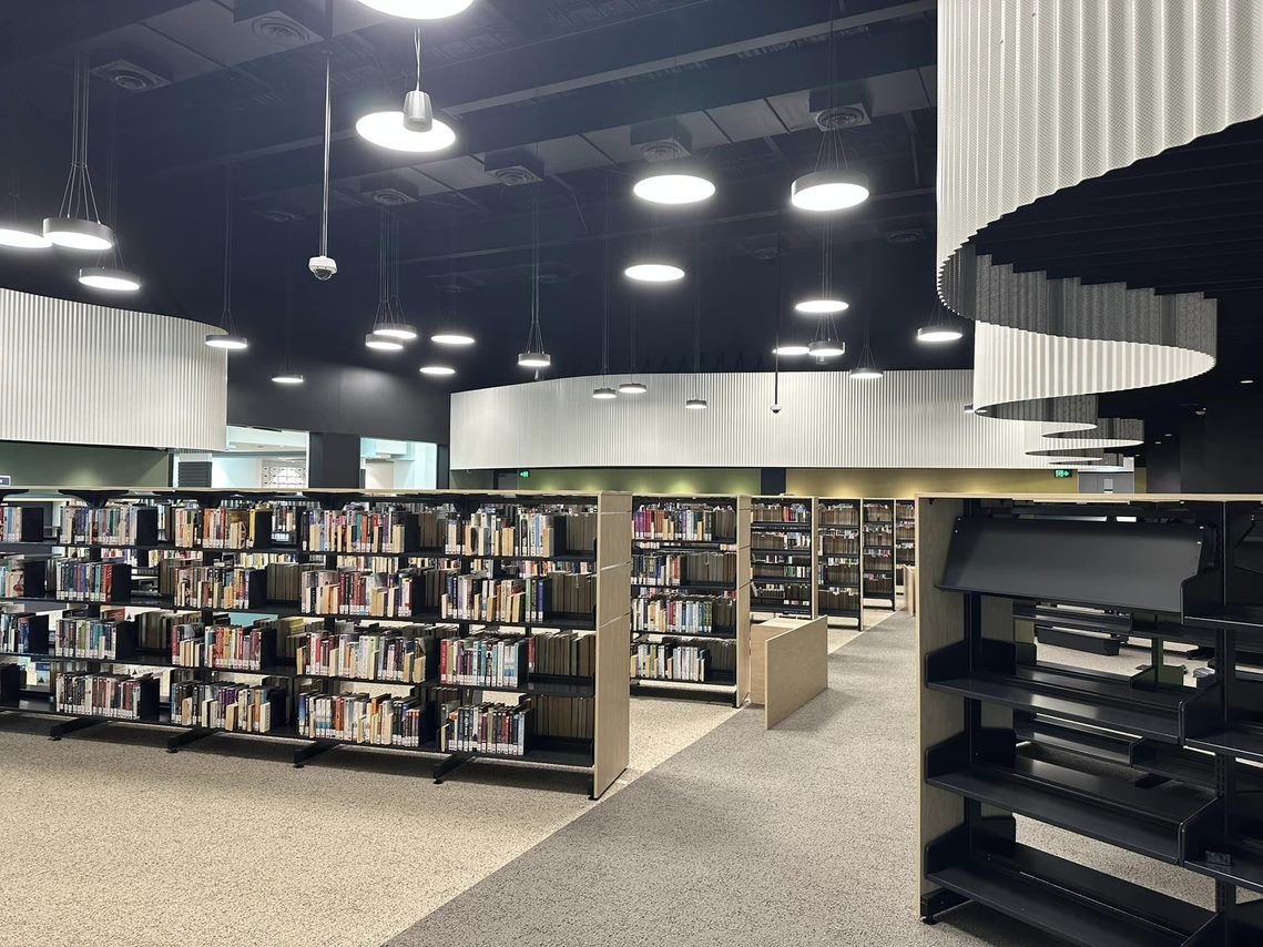 Library Interior With Bookshelves — EBS NQ Electronic Building Systems in Kirwan, QLD