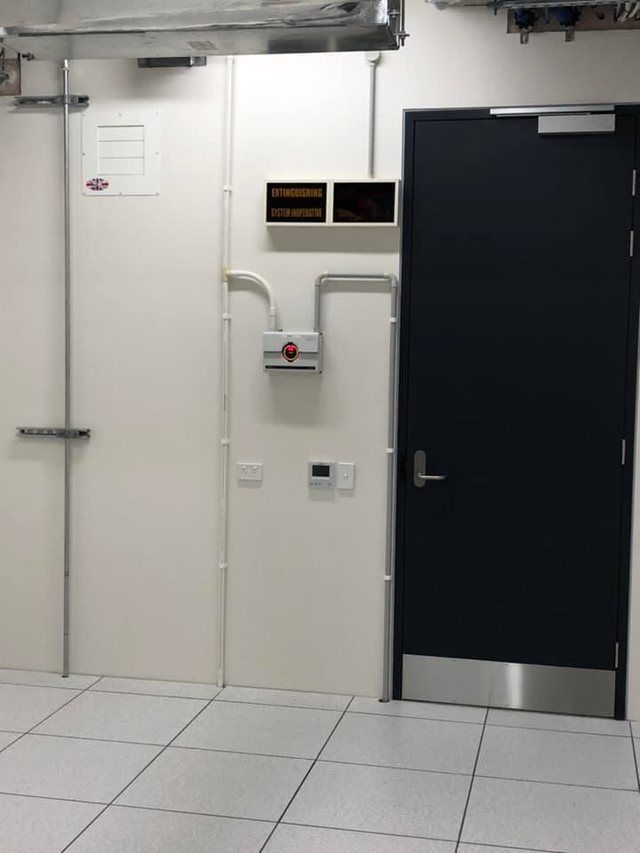 Two Doors, One White and One Dark Blue — EBS NQ Electronic Building Systems in Kirwan, QLD