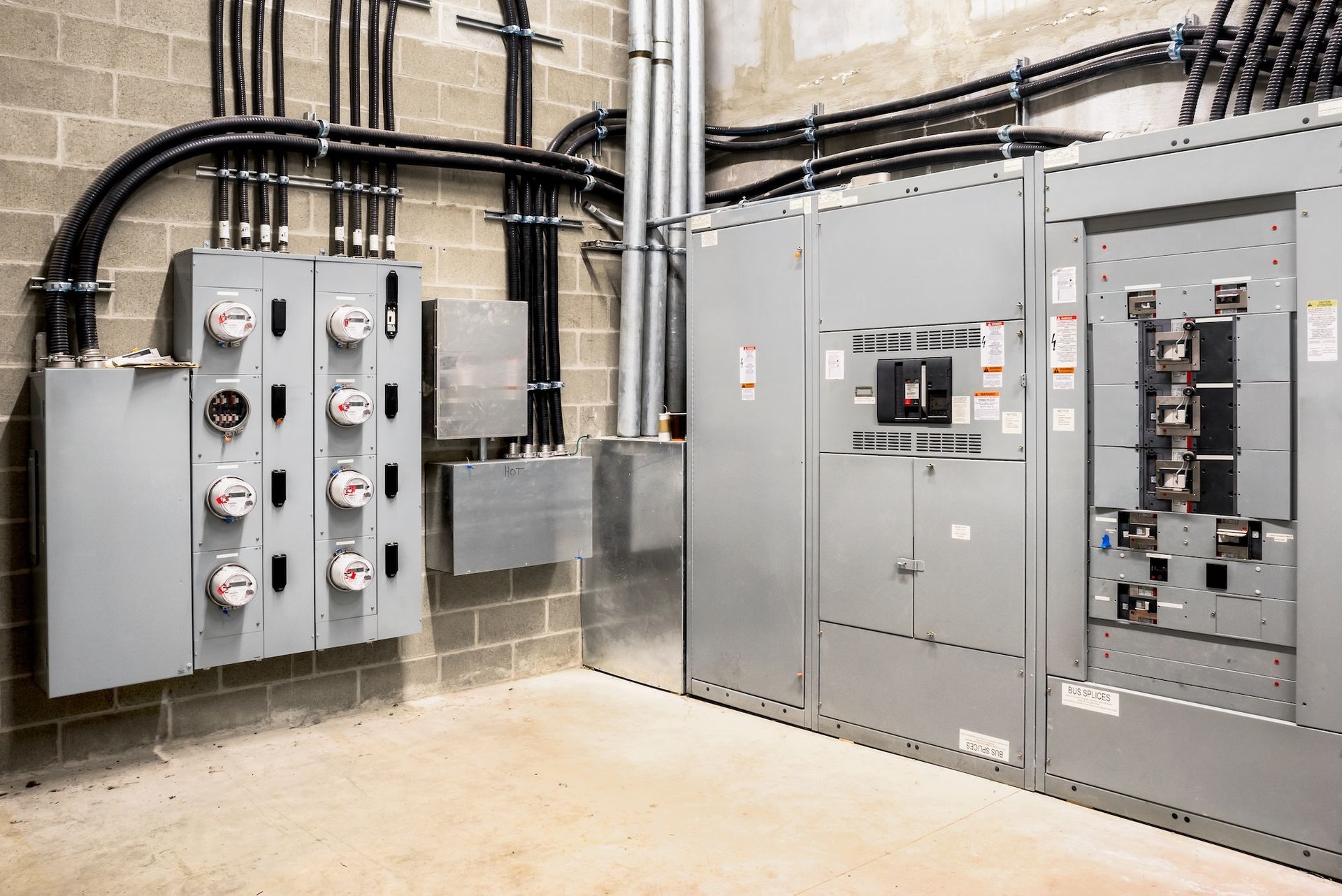Electrical Room With Gray Electrical Panels — EBS NQ Electronic Building Systems in Kirwan, QLD