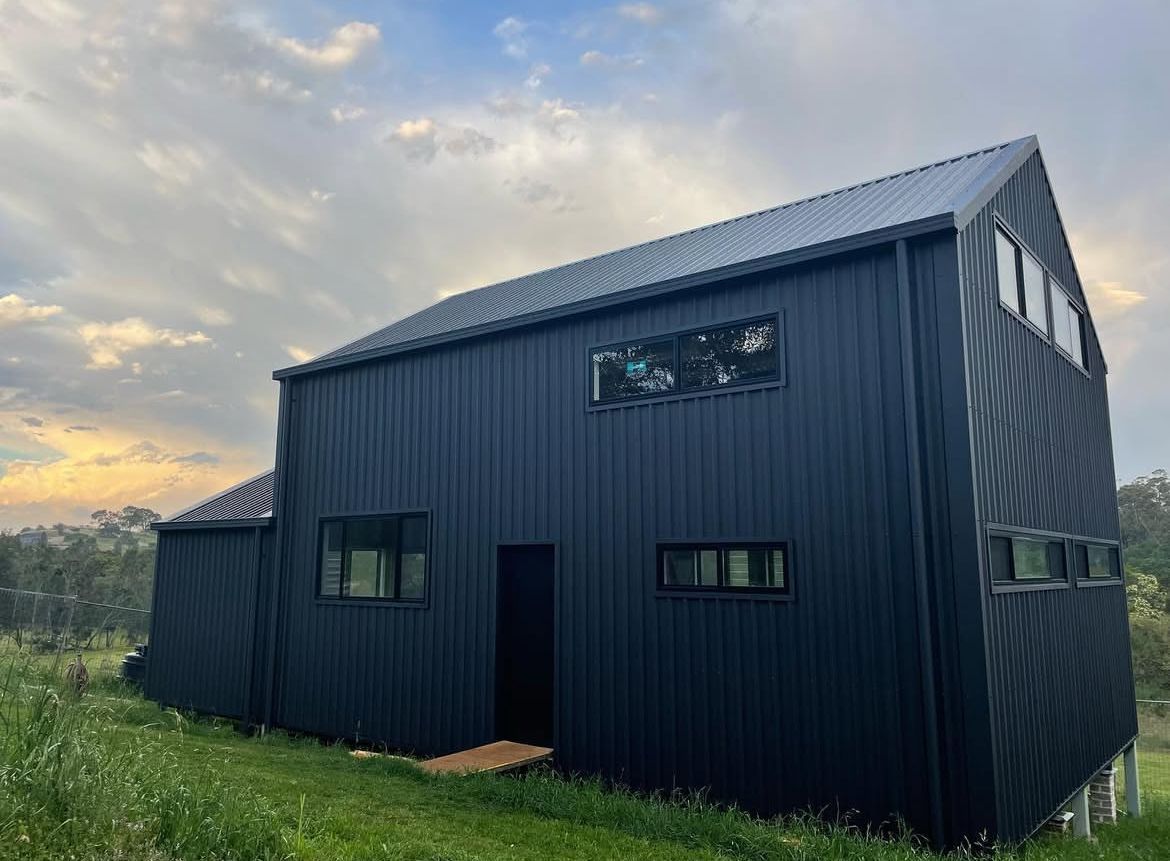 A Dark Blue Metal House — Metal Roofing by Matt Dwyer in Gerringong, NSW