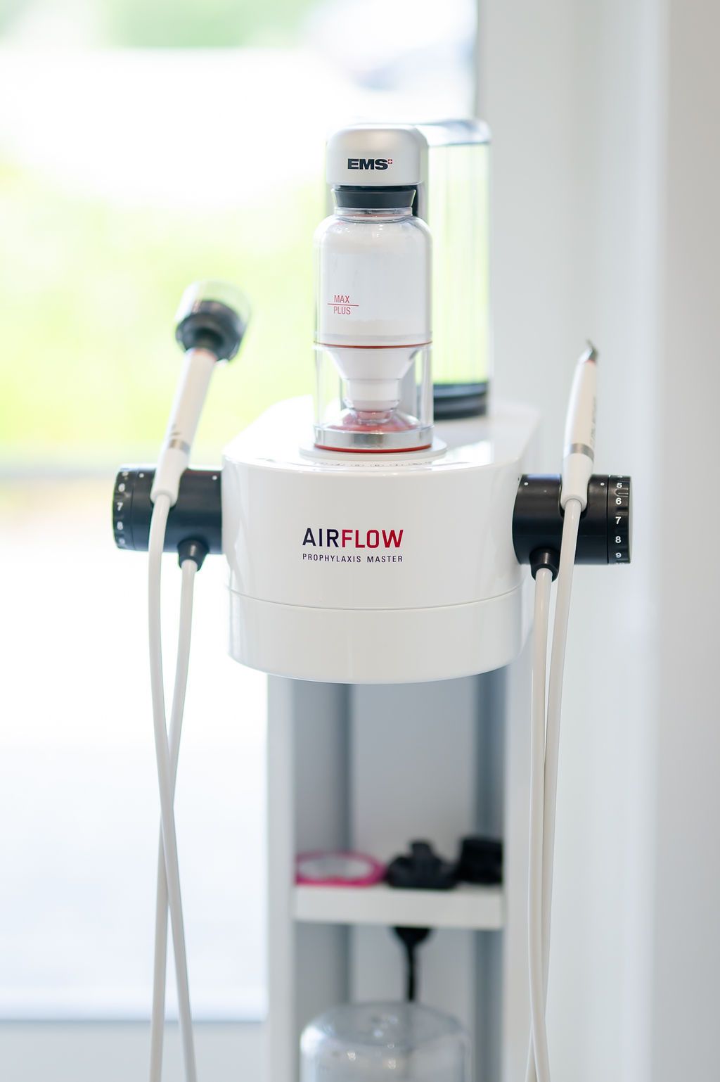 AIRFLOW medical device with attached tubing in a bright clinical setting