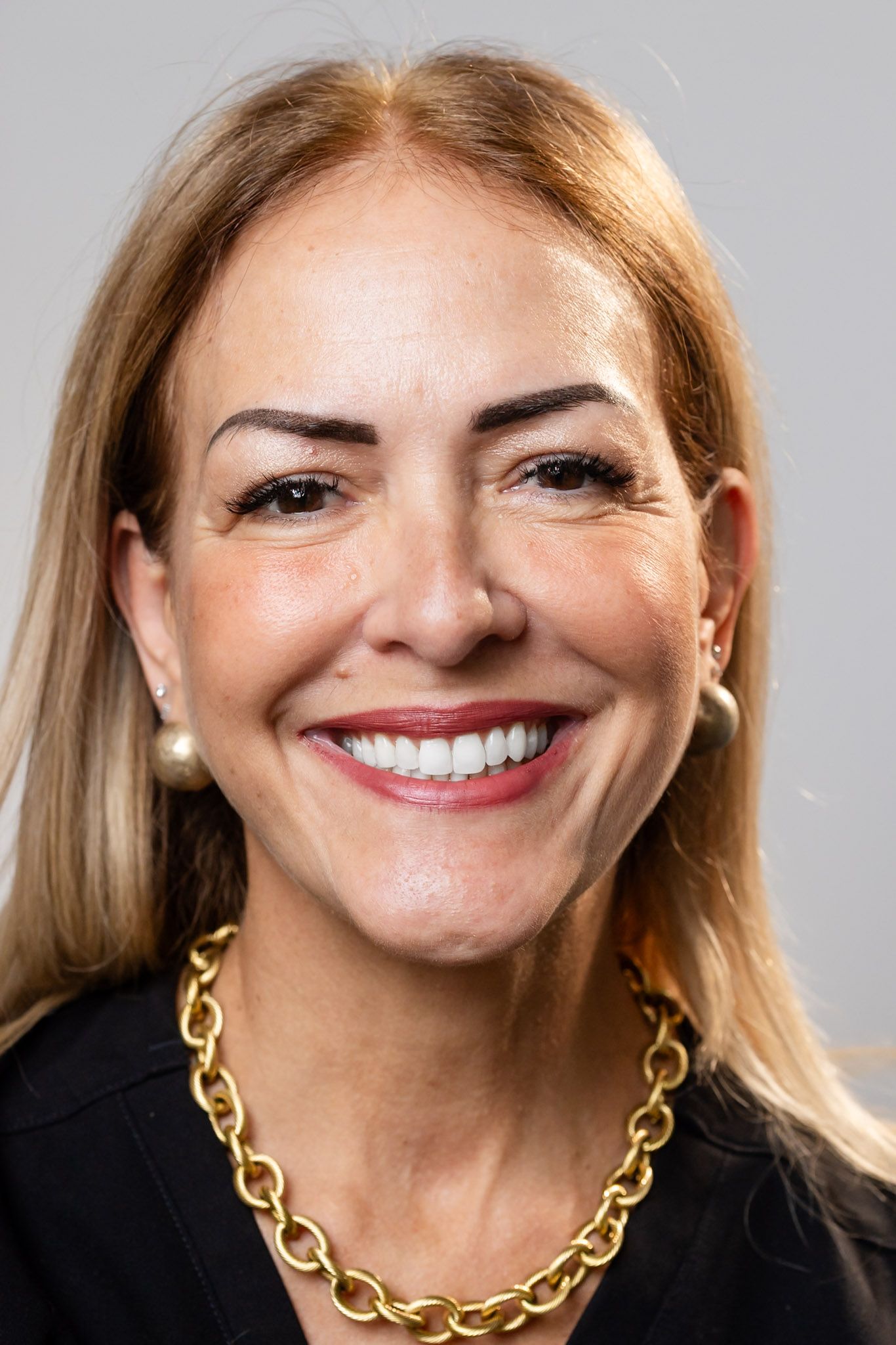 Smiling member of the GEN2 Dentistry team in Davie, FL