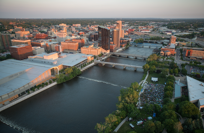 An aerial view of a city with a river running through it