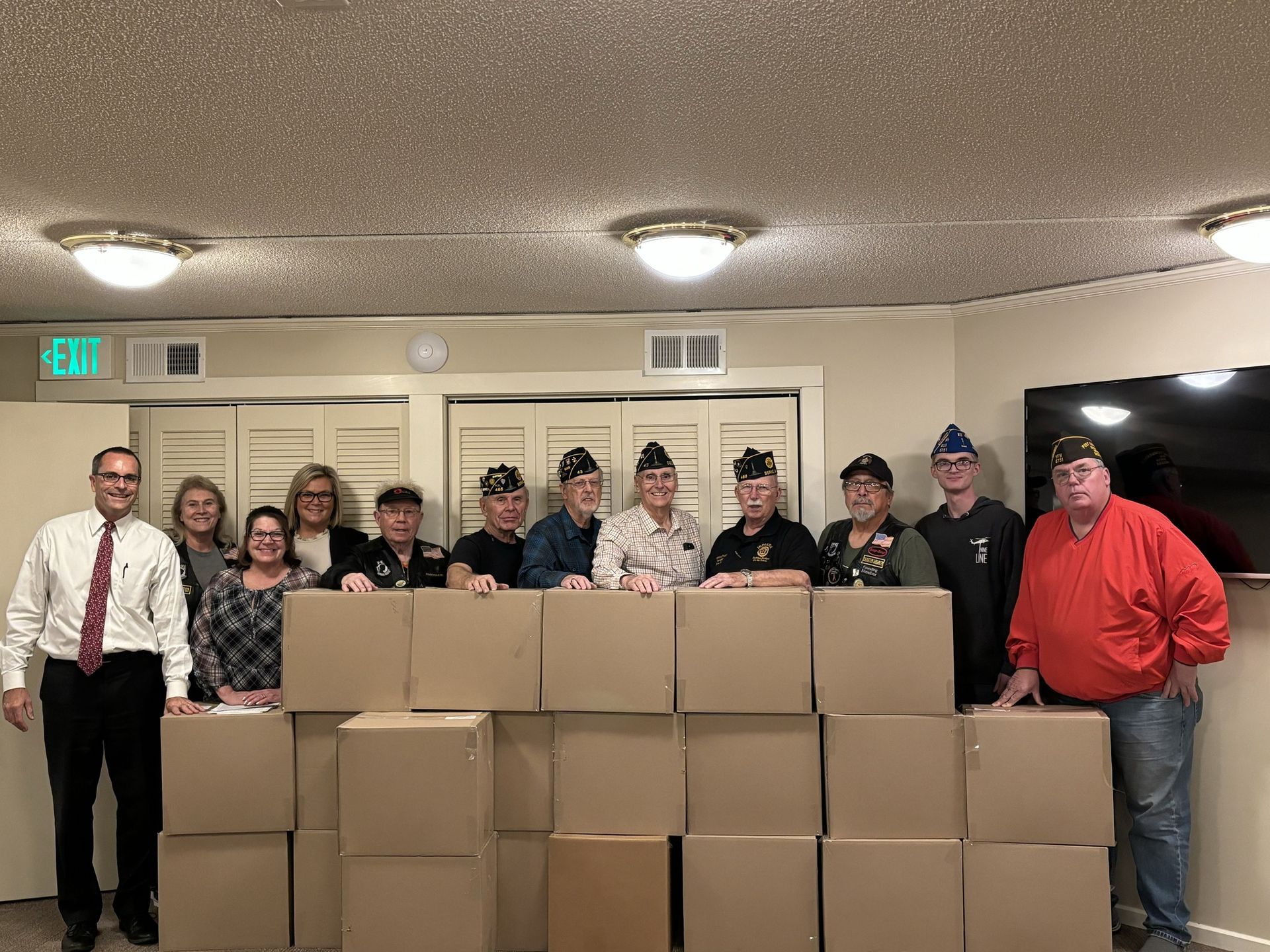 Pictured Left to Right: Jon Zwick (Zwick & Jahn); Lisa Crump (American Legion Post 43 Riders); Jen Toledo (President American Legion Post #468 Auxiliary); Jaime Beitler (Zwick & Jahn); Don Evans (American Legion Post 43 Riders); Art Booth (American Legion Post 468); Carl Stevens (American Legion Post 43); Bruce Reidenbach (American Legion Post 43); Dennis Friday (American Legion Post 468); Jesse Mendez (American Legion Post 43 Riders); Peyton Wagner (VFW Post 6751 Auxiliary); Les Wagner (V.F.W. Post 6751)