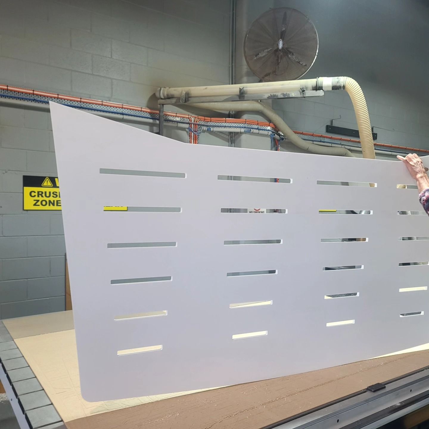 Large White Industrial Machine with Vent Slits and Pipes in A Workshop — Coastal Plastics In Lismore, NSW