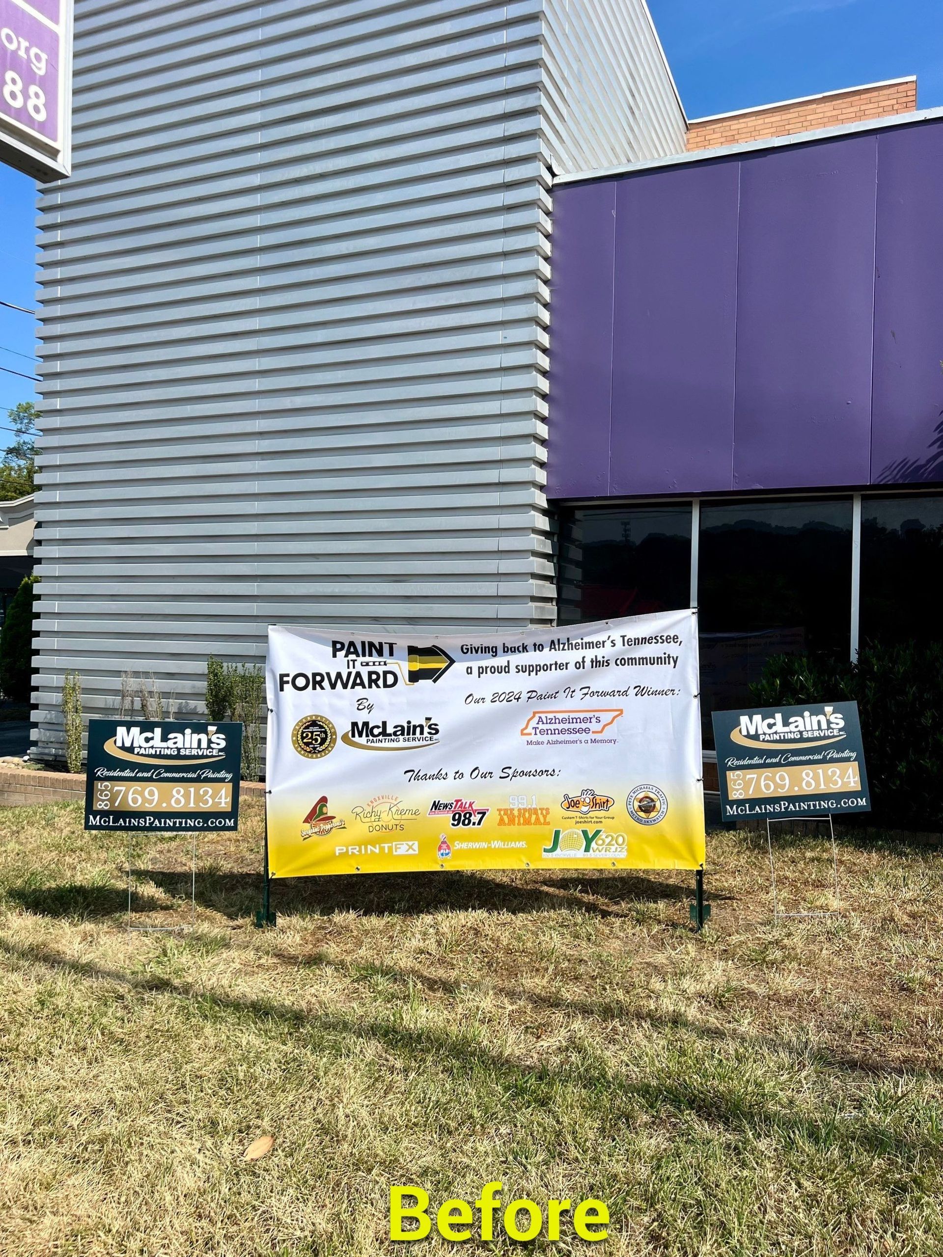 A before picture of a sign in front of a building